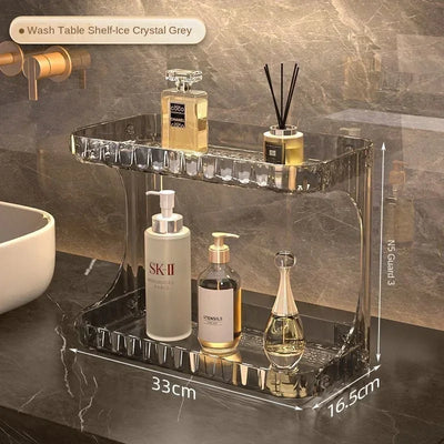 Transparent acrylic bathroom organizer on a vanity counter with measured dimensions for practical use and storage