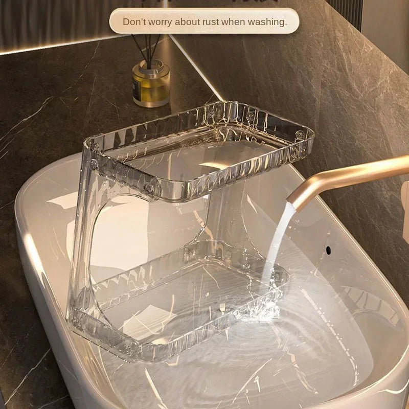 Water-resistant acrylic bathroom countertop organizer being rinsed under a faucet, showing easy-to-clean and rust-free design.