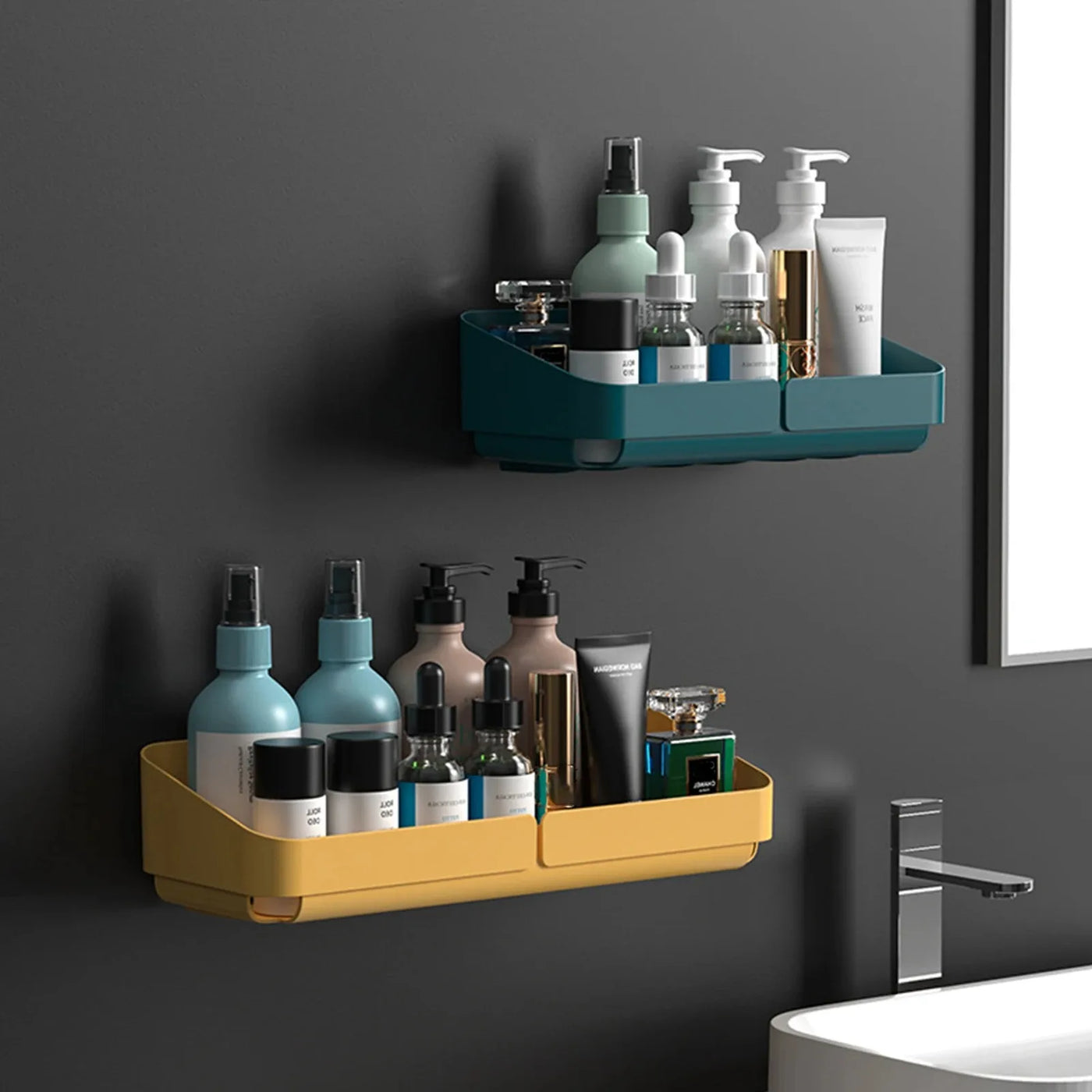 Double wall-mounted small shower caddies in yellow and green loaded with bath essentials