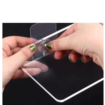 Hands installing a floating corner shelf organizer rack using secure mounting hardware