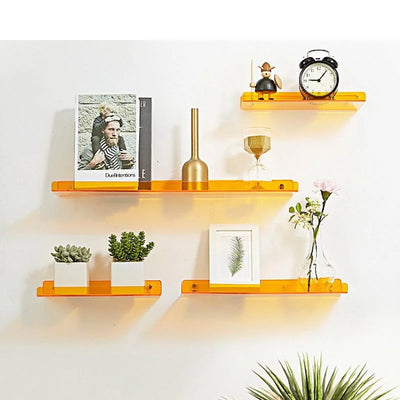 Yellow floating corner shelf organizer rack displaying books, plants, and decorative items