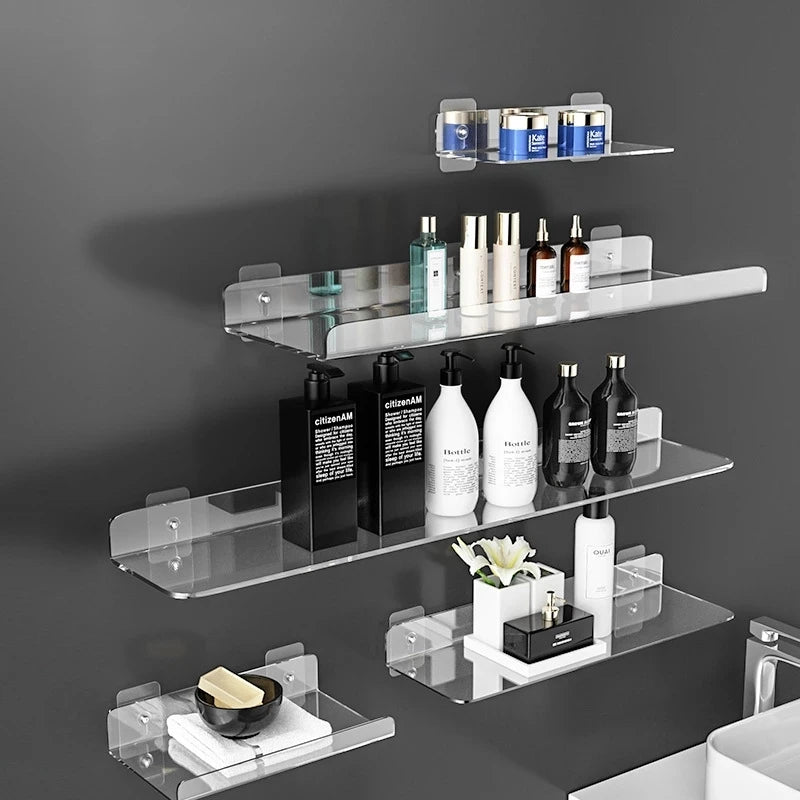 Clear acrylic floating shelves for bathroom wall with skincare and soap storage