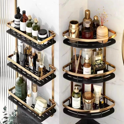 Gold stainless bathroom corner caddy organizer with multiple black shelves holding toiletries and decor items